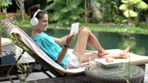 Beautiful Lady Watch Tab And Use Headphone YouTube Channel Cover Photo template