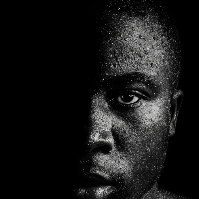 Half in Shadow Power and Resilience in Black & White Portrait Instagram Post template
